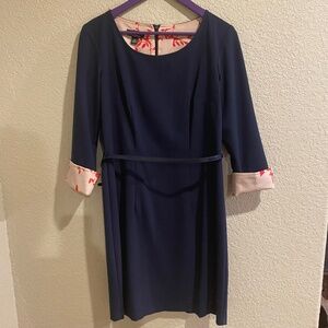 Navy blue dress with floral cuffed sleeves